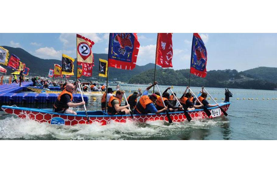 Commander, Fleet Activities Chinhae (CFAC) team launches their boat during the 15th National Turtle Boat Rowing Competition hosted by the coastal city of Tongyeong-si, South Korea, on Aug. 10 to commemorate the Battle of Hasan Island victory.
