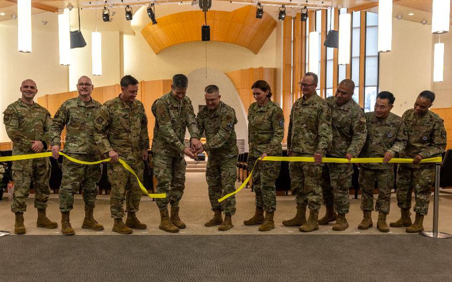 U.S. Air Force Maj. Gen. Randall Kitchens, Department of the Air Force chief of chaplains, cuts the ribbon with Col. William McKibban, 51st Fighter Wing commander, during the Osan Air Base Chapel Grand Opening Ceremony at Osan AB, Republic of Korea, Feb. 29, 2024. With the growing number of families and joint units on Osan AB, the new chapel was built to adequately support the growing population.The new chapel commits to maintaining its service to Airmen for the next 50 years, demonstrating an investment in Osan today for the Airmen of tomorrow.