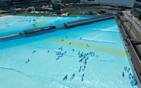 Visitors enjoying surfing in the park.