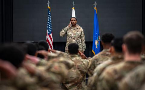 Photo Of U.S. Air Force Maj. Kristal Wong, incoming 51st Comptroller Squadron commander, renders her first salute.