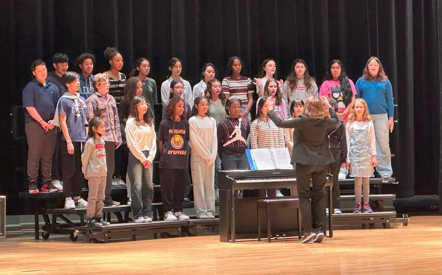 HMS Choir singing a melody “We Shall Overcome/Lean On Me” led by HMS Music Teacher Ms. Virginia Ford