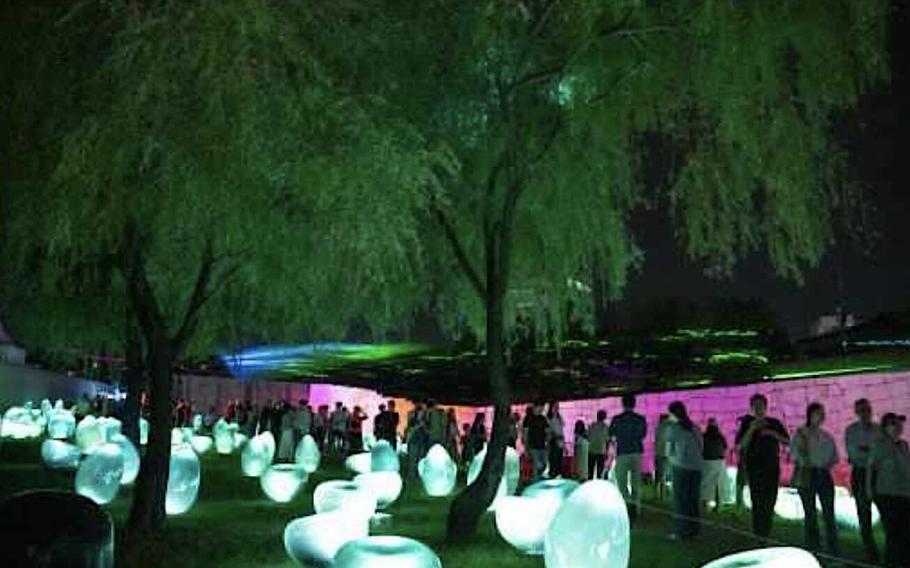 Visitors enjoy one of the festivals in Seoul.