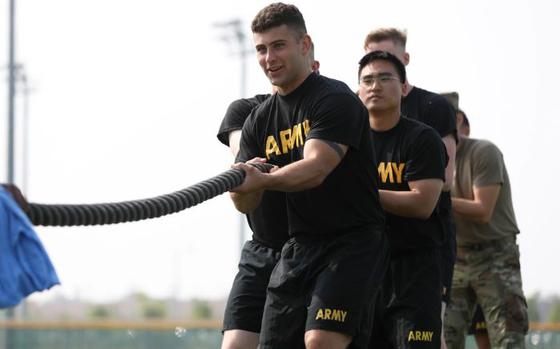 Soldiers participate in the tug of war competition during KATUSA Friendship Week, Camp Humphreys, Republic of Korea, June 10, 2022. This event is hosted annually to facilitate unit cohesion, solidify friendship and foster a cultural understanding between both countries. 