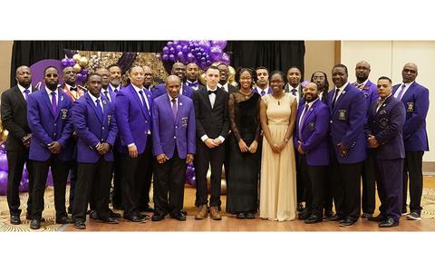 Photo Of 2024 International Essay Contest Winners (1st Place Winner – Abigail Loken, 2nd Place Winner – Julia McCants, and 3rd Place Winner Diego Sanchez-Rivera from Humphreys High School) with the Brothers of Lambda Xi Chapter of Omega Psi Phi Fraternity, Inc.