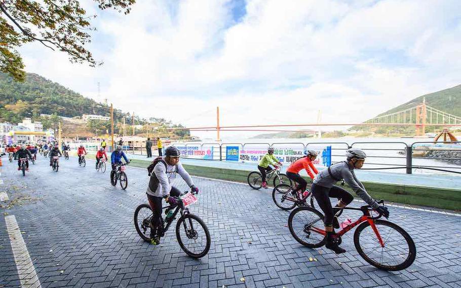Participants for the race are riding a bike.