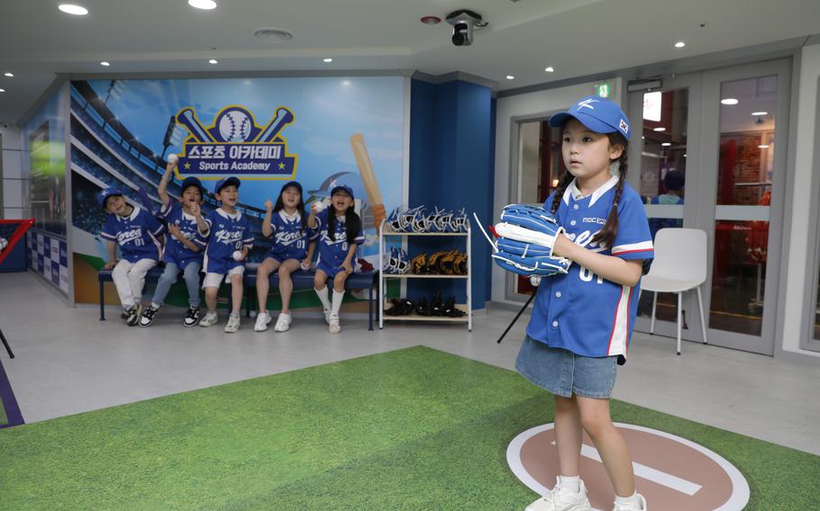 Kids are playing baseball.