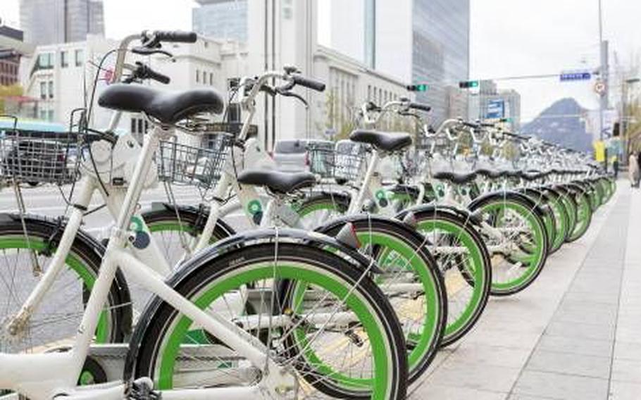 bikes are parked on the road.