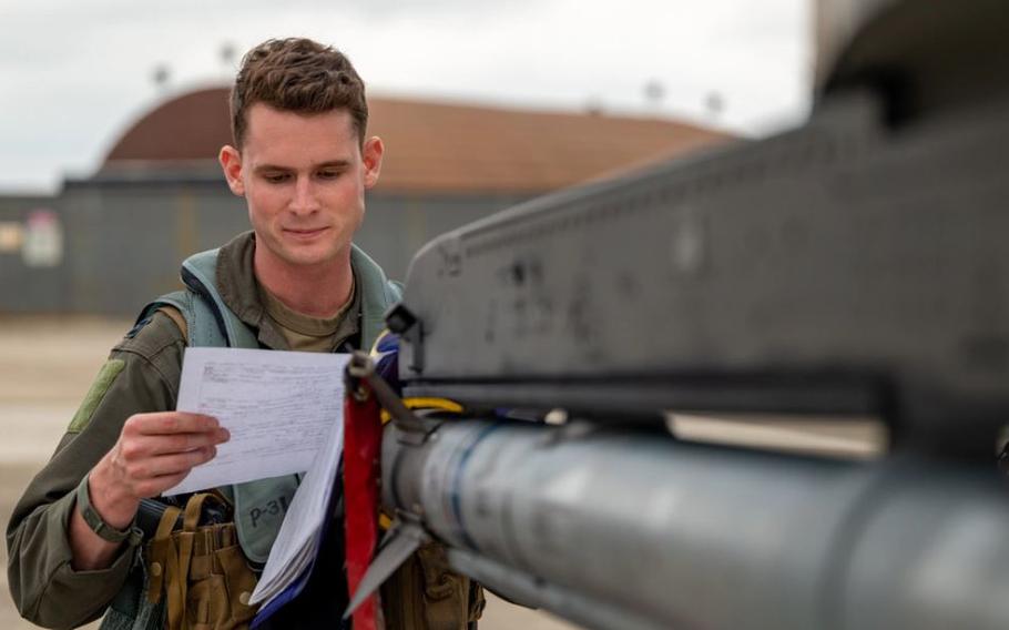 Capt. Ryan Woodall, 35th Fighter Squadron pilot, reviews the work done on an F-16 Fighting Falcon during Beverly Pack 24-1 at Gwangju Air Base, Republic of Korea, May 7, 2024. Training rapid response reflexes and the generation of combat airpower in unfamiliar locations preserves the ability to conduct effective operations in contested environments.