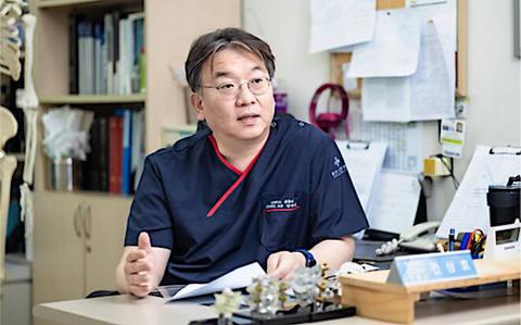 Photo Of A doctor talks.