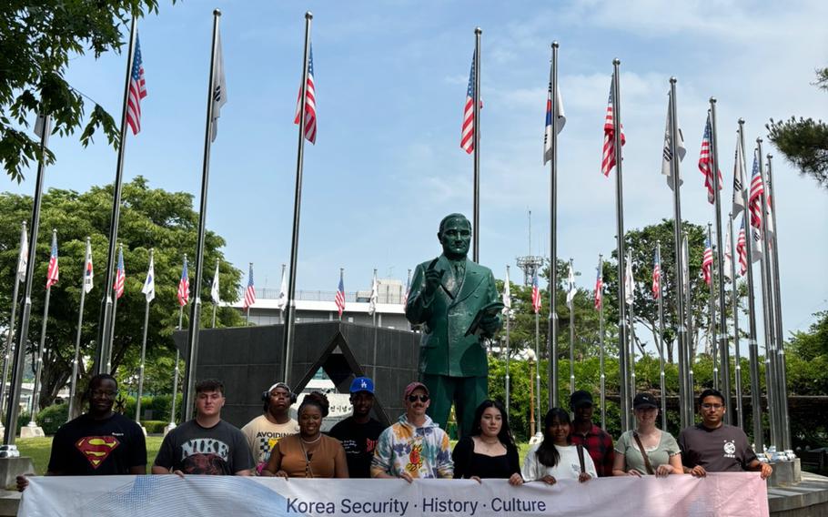 Participants pose for a photo in DMZ.