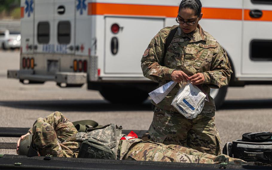 Staff Sgt. Bionca Gunter, 8th Operational Medical Readiness Squadron flight medical technician, renders medical aid to a simulated casualty during exercise Beverly Pack 24-1 at Kunsan Air Base, Republic of Korea, May 9, 2024. The 8th Fighter Wing executes a continuous training schedule designed to improve contingency response capabilities.
