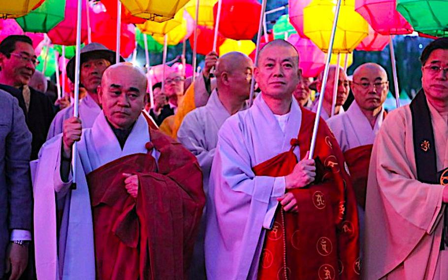 some monks are enjoying the festival.