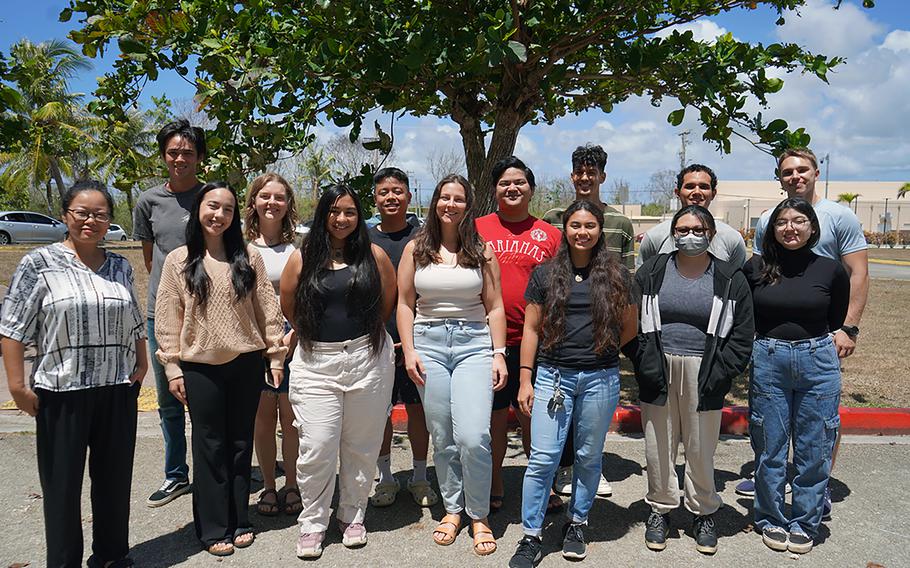            University of Guam Assistant Professor Dr. Wei Xiao, left, and her Plant Systematics class from the Spring 2024 semester. The class worked on a project to review regional botanical literature for several potentially new weeds growing in urban environments in Guam. They found 16 species that were not in any prior literature. 
 
                    