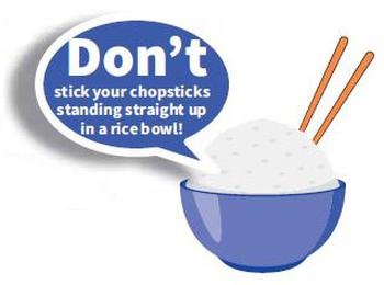 Don’t stick your spoon or chopsticks standing straight up in a rice bowl.