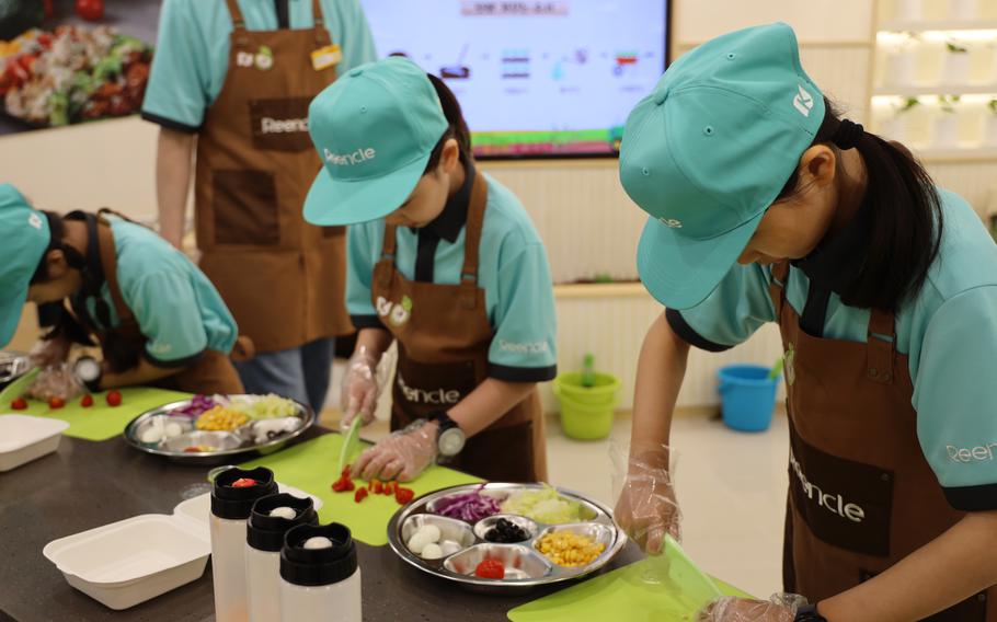 Kids are cooking.
