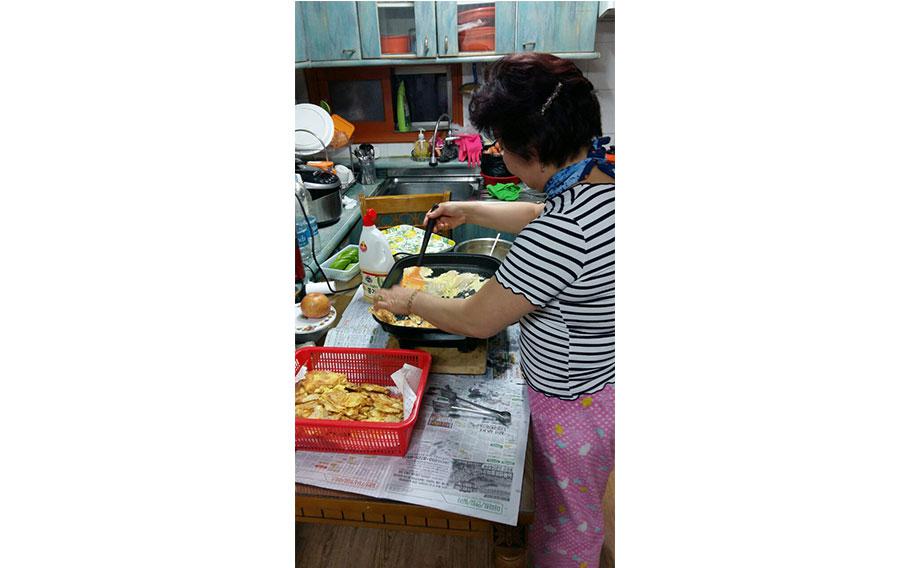 One of my aunts cooks jeon (fritter and pancake) for ancestral rites the day before Seollal. 