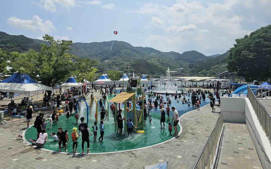 Visitors enjoying a pool.