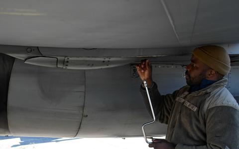 Photo Of U.S. Air Force Airman First Class Quatavious Cash, Cobra assistant f-16 dedicated crew chief, tightens a screw on the horizontal stabilizer panel during Buddy Squadron 25-3, at Jungwon Air Base, Republic of Korea, Dec. 10, 2024. Buddy Squadron events reinforce the 8th Fighter Wing’s ability to deliver capable F-16 Fighting Falcons anywhere on the Korean peninsula in support of regular and ACE operational objectives.