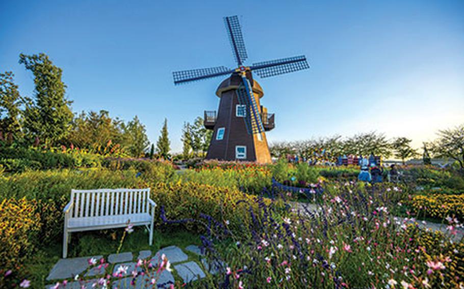 There is a windmill in the garden.