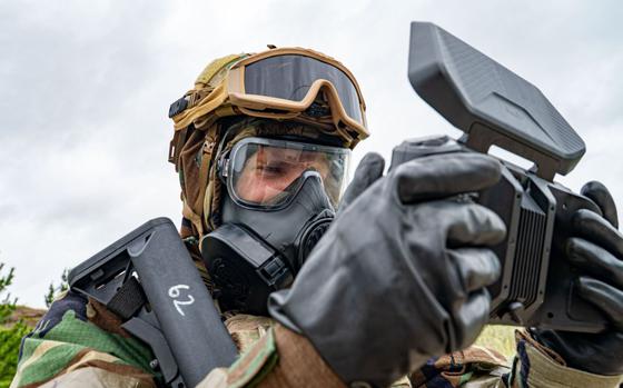 Senior Airman Alexander Moose flies a drone to provide real-time information.
