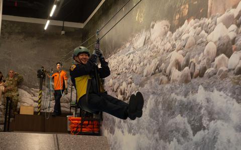 Photo Of Juhyuk Baek, 51st Civil Engineer Squadron fire inspector, crosses a simulated flooded river.