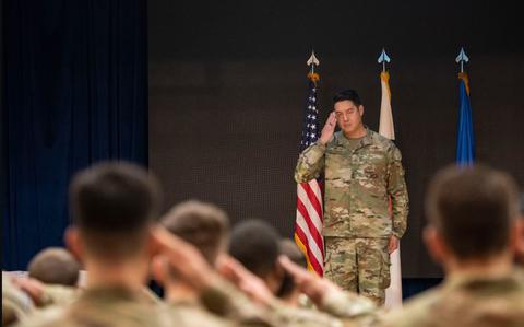 Photo Of U.S. Air Force Maj. Albert Yin receives his first salute.