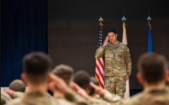 U.S. Air Force Maj. Albert Yin receives his first salute.