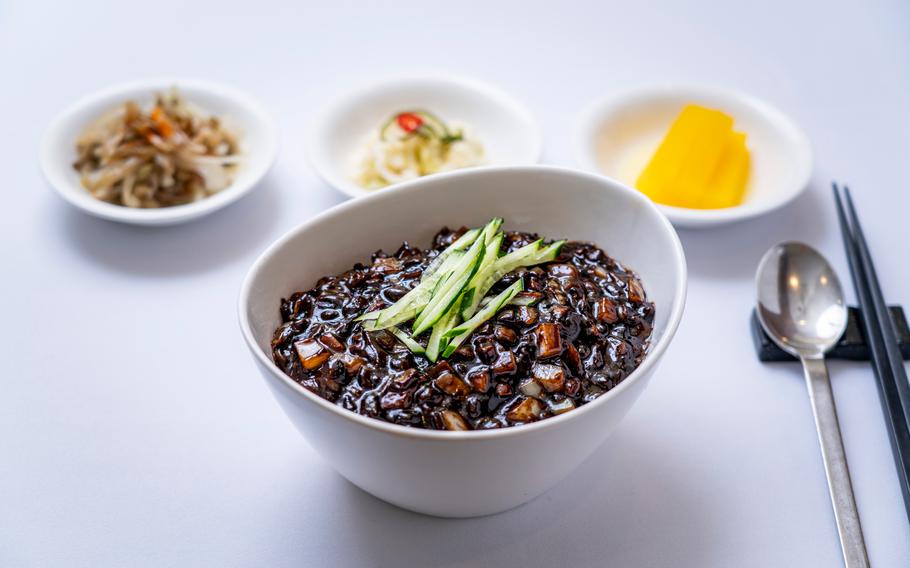 Jjajangmyeon(Noodles in black bean sauce) is on the table.