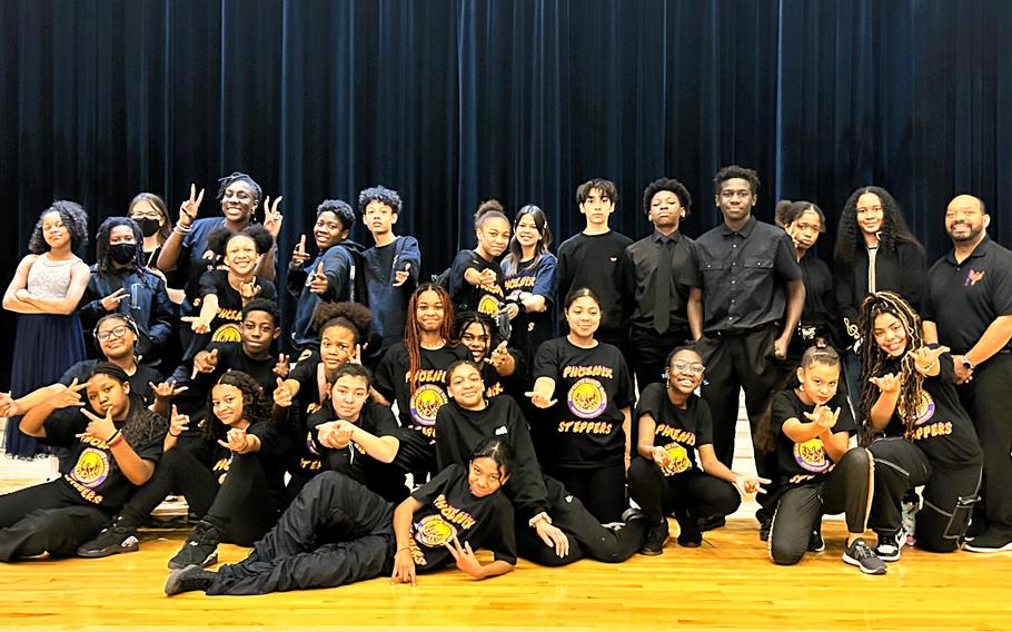 HMS Black History Month participants with event organizer/ HMS Counselor Ms. Destiny Jordan and Administrative Officer Mr. Michael Robinson