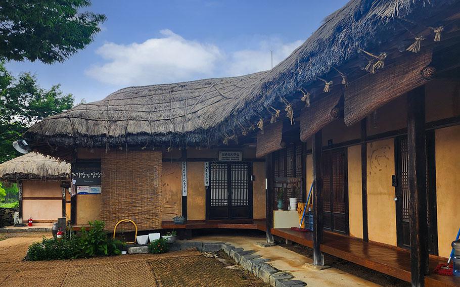 Thatched-roof hanok home.