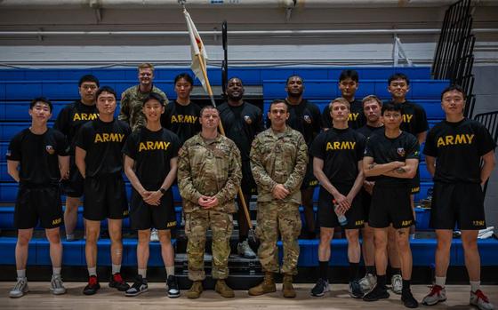 U.S. Soldiers and Korean Augmentation to the U.S. Army (KATUSA) Soldiers assigned to Headquarters and Headquarters Company, U.S. Army Garrison Yongsan-Casey pose for a group photo.