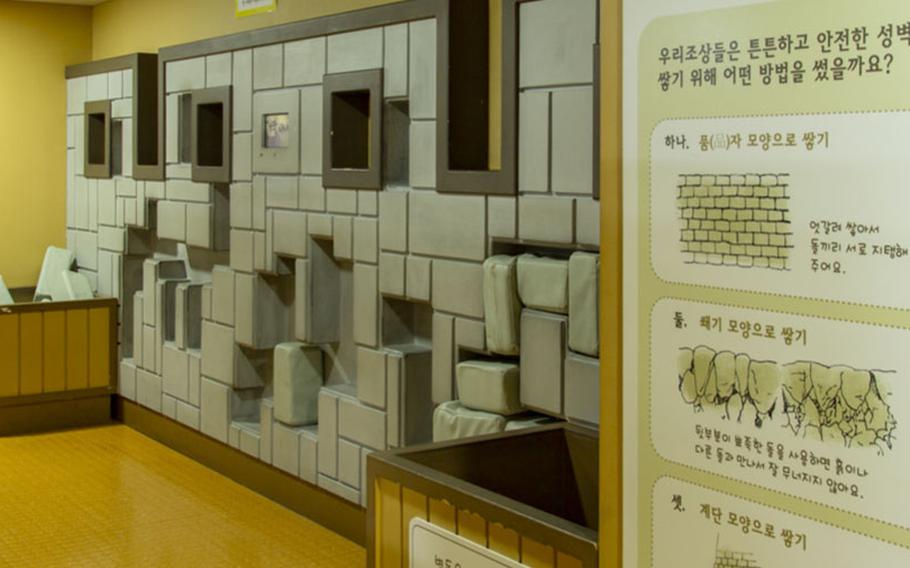 An exhibition that shows how to build a stone wall.