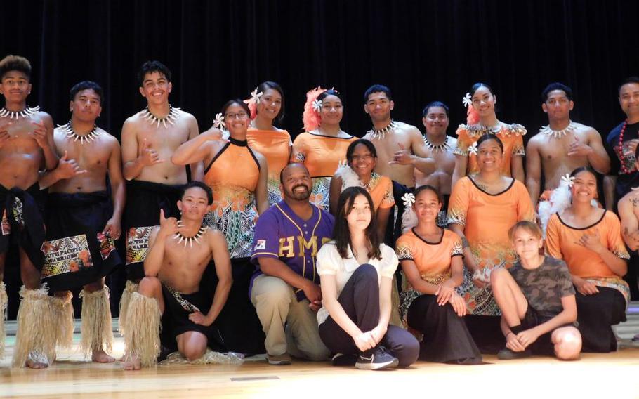 HMS Asian American Pacific Islander Heritage Month Program Coordinator Mr. Michael Robinson, Mistress of Ceremony 8th grader Annabel Hightower and Master of Ceremony 6th grader Zach Killgren with special guest “The South Pacific Warriors.”