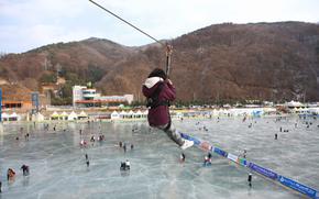 a person enjoying rope sliding.