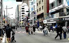 People are walking the car-free cultural street.