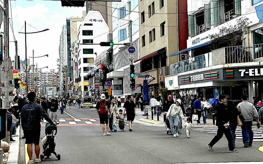 People are walking the car-free cultural street.