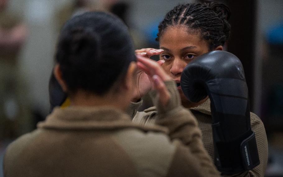 U.S. Air Force Senior Airman Jeanette Casiano, 621st Air Control Squadron weapons director, left, and Senior Airman Breyon Kamoze, 621st ACS battle management operator, participate in a training exercise together during a combatives instructor certification course at Osan Air Base, Republic of Korea, Feb. 23, 2024. The 621st ACS intends to utilize this skill for the operational needs of their unit. They are also capable of instructing members from the 51st Fighter Wing at a later date. The 621st ACS impacts the “Fight Tonight” mission by supporting training and contingency operations of the 51st Fighter Wing, providing lethal tactical battle management for the Air Component Commander during armistice and war. 