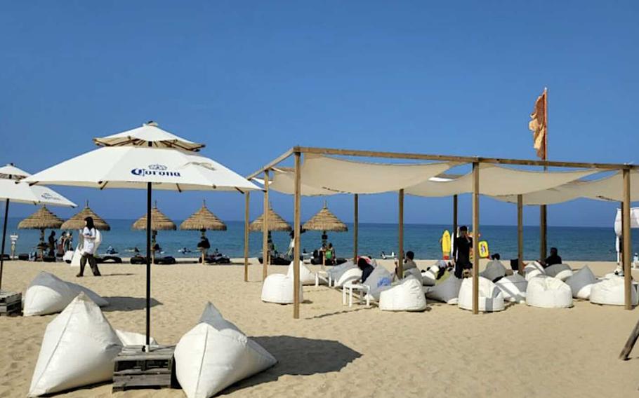 People are enjoying themselves at Haeundae Beach, Busan.