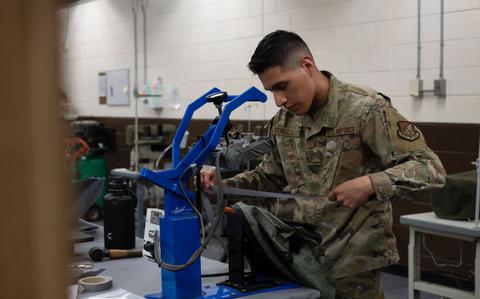 Photo Of U.S. Air Force Senior Airman Keven Gomescoello, 51st Operations Support Squadron aircrew flight equipment technician, applies seam tape to an anti-exposure suit at Osan Air Base, Republic of Korea, May 22, 2025. Suit maintenance ensures pilots remain protected during over-water operations, which are common in the Indo-Pacific region. 