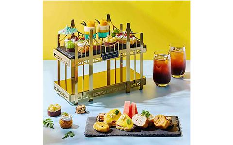 Photo Of Some sweets and two glasses of cold beverages are on the table.