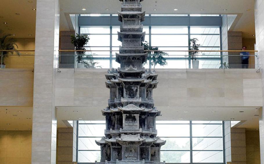 A miniature of a tower.