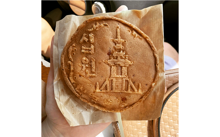 A full close-up photo of a 10-won Cheese Bread.