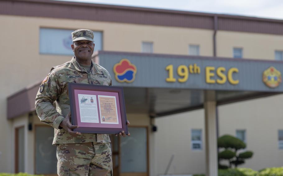 Command Sgt. Maj. AnDante' Williams received the Silver Spike Award for his 18 months of leadership at 25th Transportation Battalion. Photo by PFC Kim, Jae Hyeong, 19th Expeditionary Sustainment Command