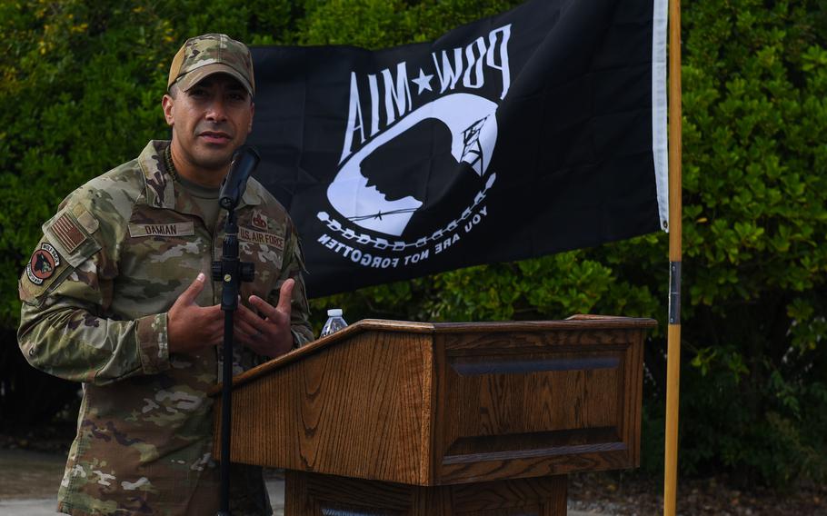 Chief Master Sgt. Carlos Damian, 8th Fighter Wing command chief, gives closing remarks during a Prisoner of War and Missing in Action ceremony at Kunsan Air Base, Republic of Korea, Oct. 7, 2022. Annually, POW/MIA members are honored and while the military continues to fight for their country, they still remember those who came before them and participate in recovering the remains of those still missing. (U.S. Air Force photo by Tech. Sgt. Timothy Dischinat)