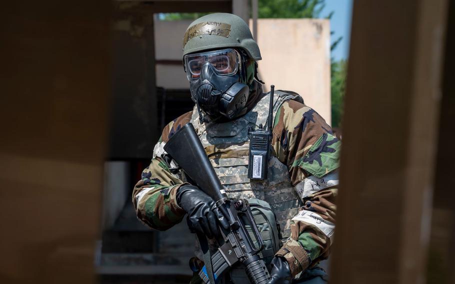 U.S. Air Force Senior Airman Diego Boyd, 51st Communications Squadron cable and antennas systems, responds to a simulated attack scenario during Beverly Herd 24-1 at Osan Air Base, Republic of Korea, May 14, 2024.