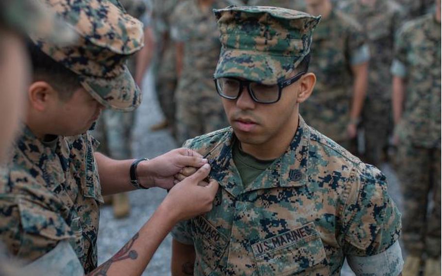 U.S. Marine Corps Sgt. Jason Santiagobirriel, a logistics embark specialist with U.S. Marine Corps Forces Korea, is promoted to the rank of Staff Sergeant during a promotion ceremony at U.S. Army Garrison Humphreys, Republic of Korea, May 6th, 2024.