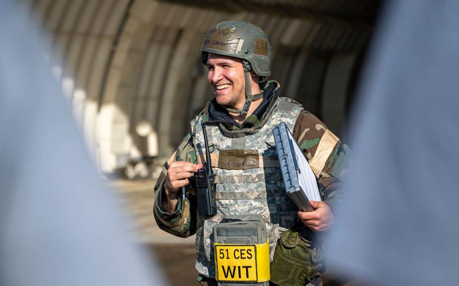 U.S. Air Force Staff Sgt. Adam Carroll, 51st Civil Engineer Squadron non-commissioned officer in charge of training, gives an after-action report during Beverly Herd 24-1 at Osan Air Base