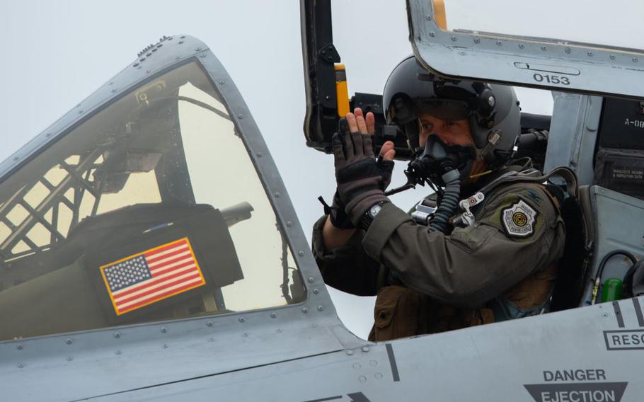 U.S. Air Force Col. William McKibban, 51st Fighter Wing commander, prepares to disembark an A-10 Thunderbolt II as he concludes his fini flight for the aircraft at Osan Air Base, Republic of Korea.