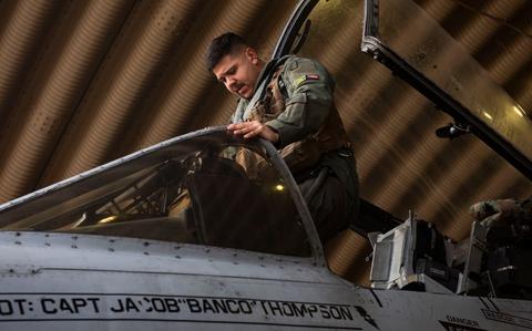 Photo Of U.S. Air Force Capt. Christian Alvarado, 25th Fighter Squadron A-10 Thunderbolt II pilot, enters the aircraft, at Osan Air Base, Republic of Korea.