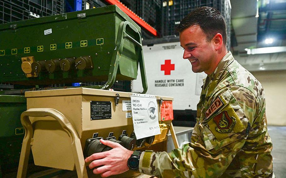 Tech. Sgt. Shane Borodycia, 8th Healthcare Operations Squadron supply operations section chief, performs a cannon plug during a power distribution panel demonstration, at Kunsan Air Base, Republic of Korea, June 1, 2023. Borodycia was recognized as Pride of the Pack for the Week of May 29, through June 2. Pride of the Pack is a base initiative that recognizes outstanding performers for their contributions to the Wolf Pack mission. (U.S. Air Force photo by Senior Airman Karla Parra)